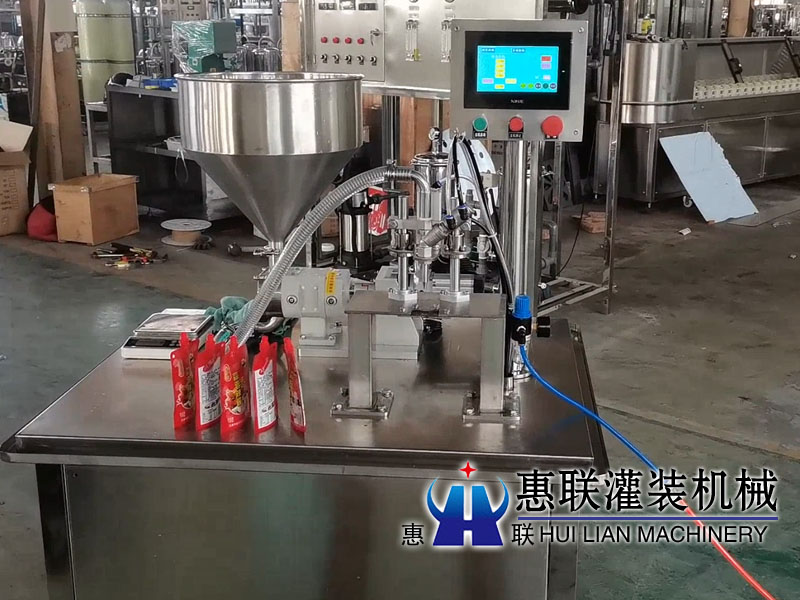 半自動(dòng)轉(zhuǎn)子泵自立袋灌裝機(jī)